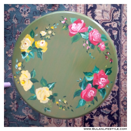 garland of roses painted on stool