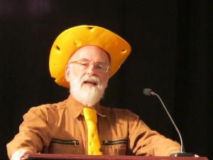 Terry Pratchett in a yellow hat