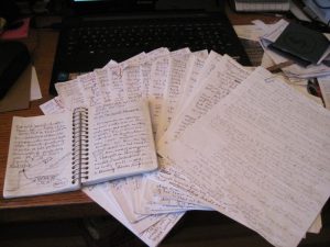 manuscript and notebook She Who Comes Forth work in progress